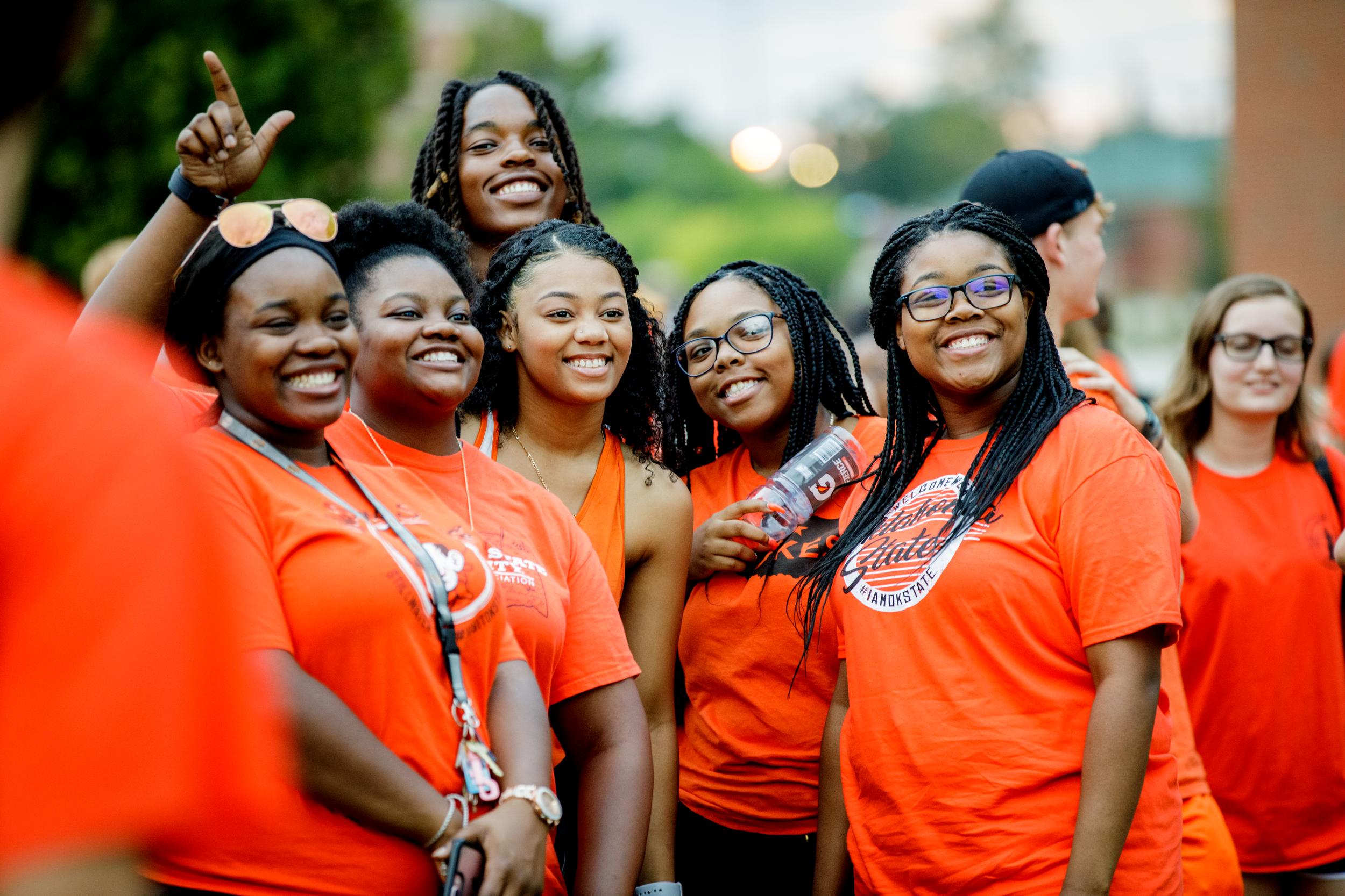 A group of OSU students smiling for the photographer