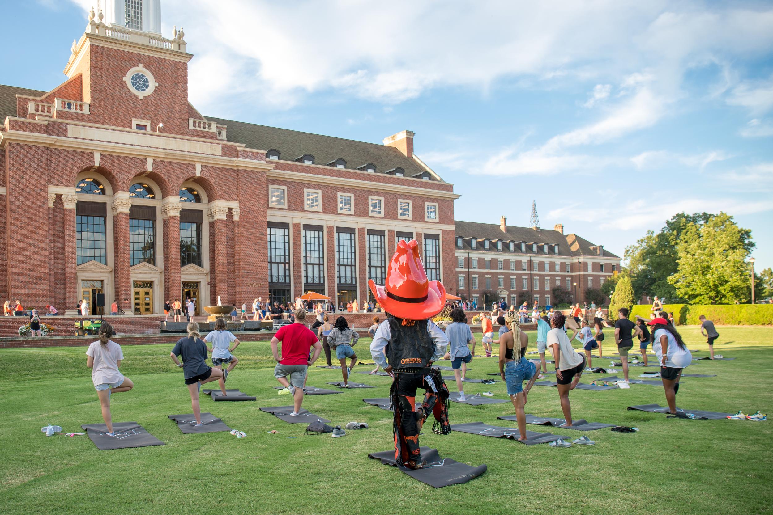 Pete joining yoga on the library lawn to help calm his mind for his upcoming presentation.