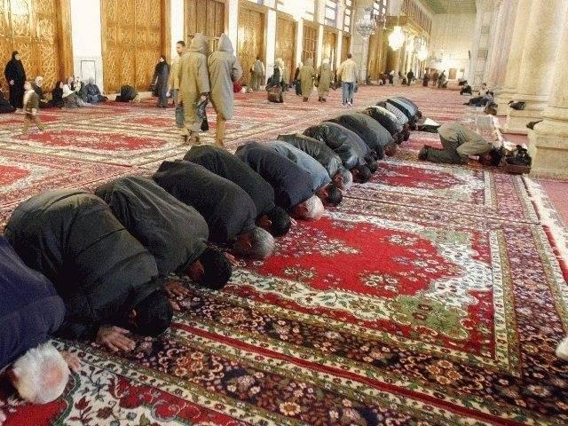 Muslims praying towards Mecca