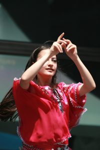 A woman communicating in American Sign Language